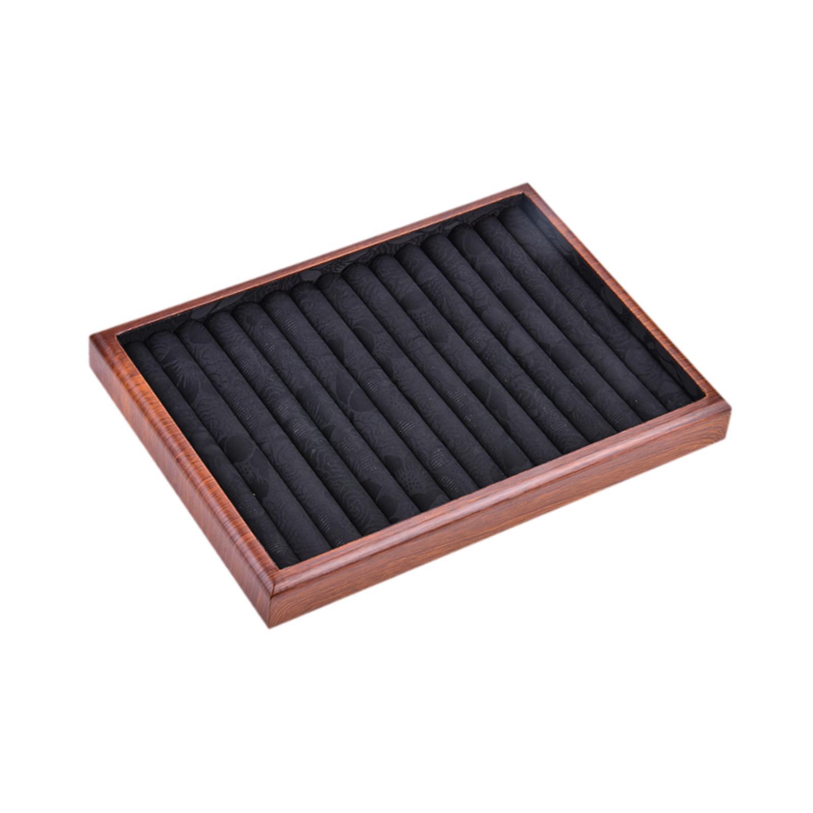 Tray of jewelry in elegant wood tray for the sale of drawers for